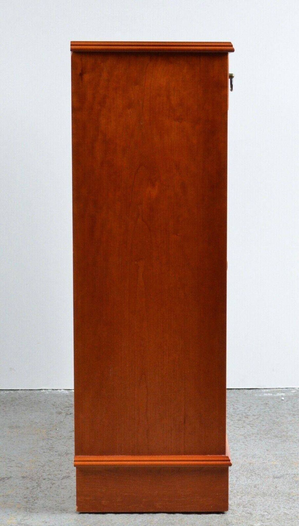 Pair of light walnut bookshelves with inlays and adjustable shelves.