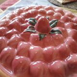 Glazed ceramic dessert plate with strawberry design.