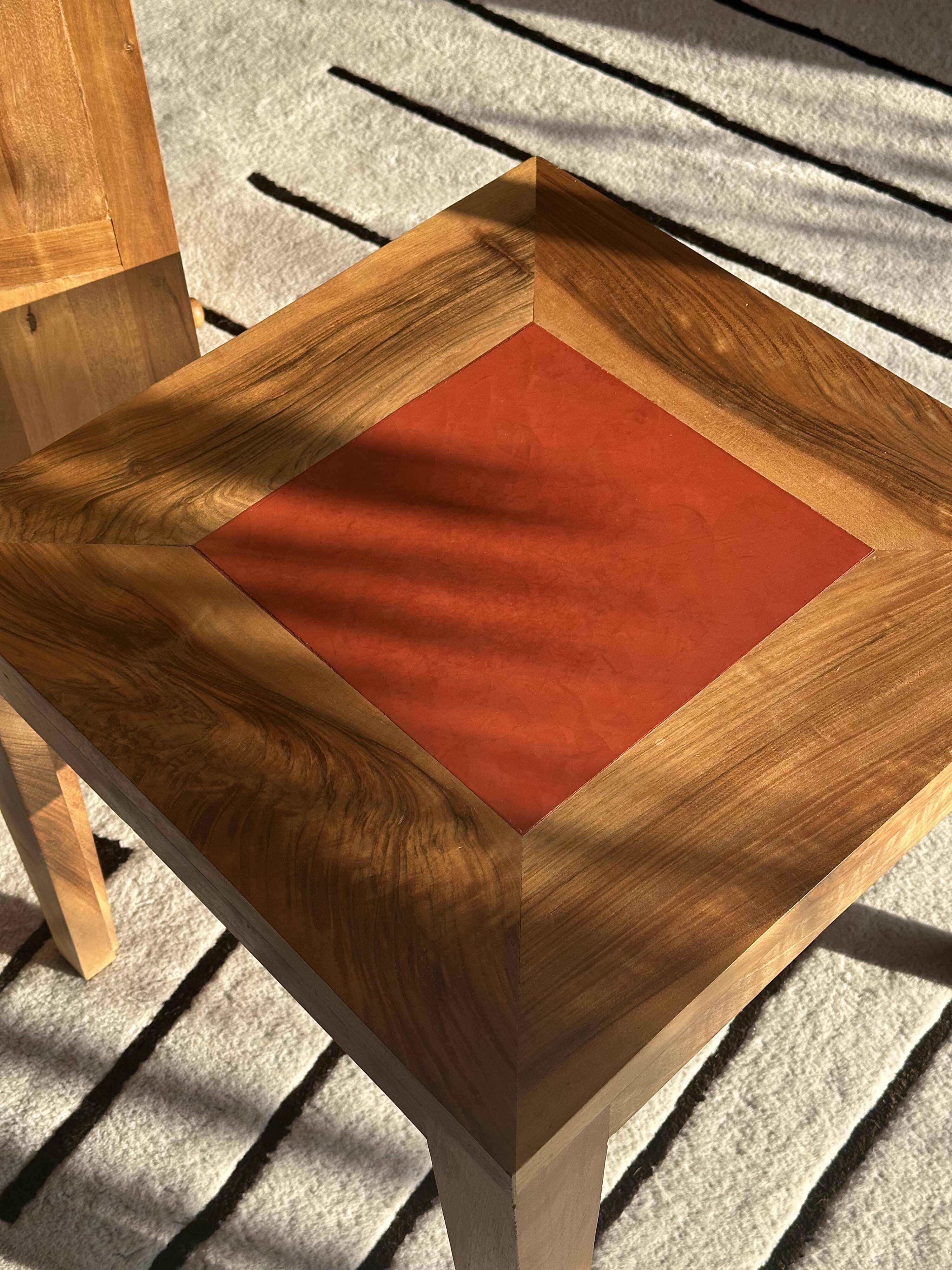 Coffee table in walnut with a tadelakt top.