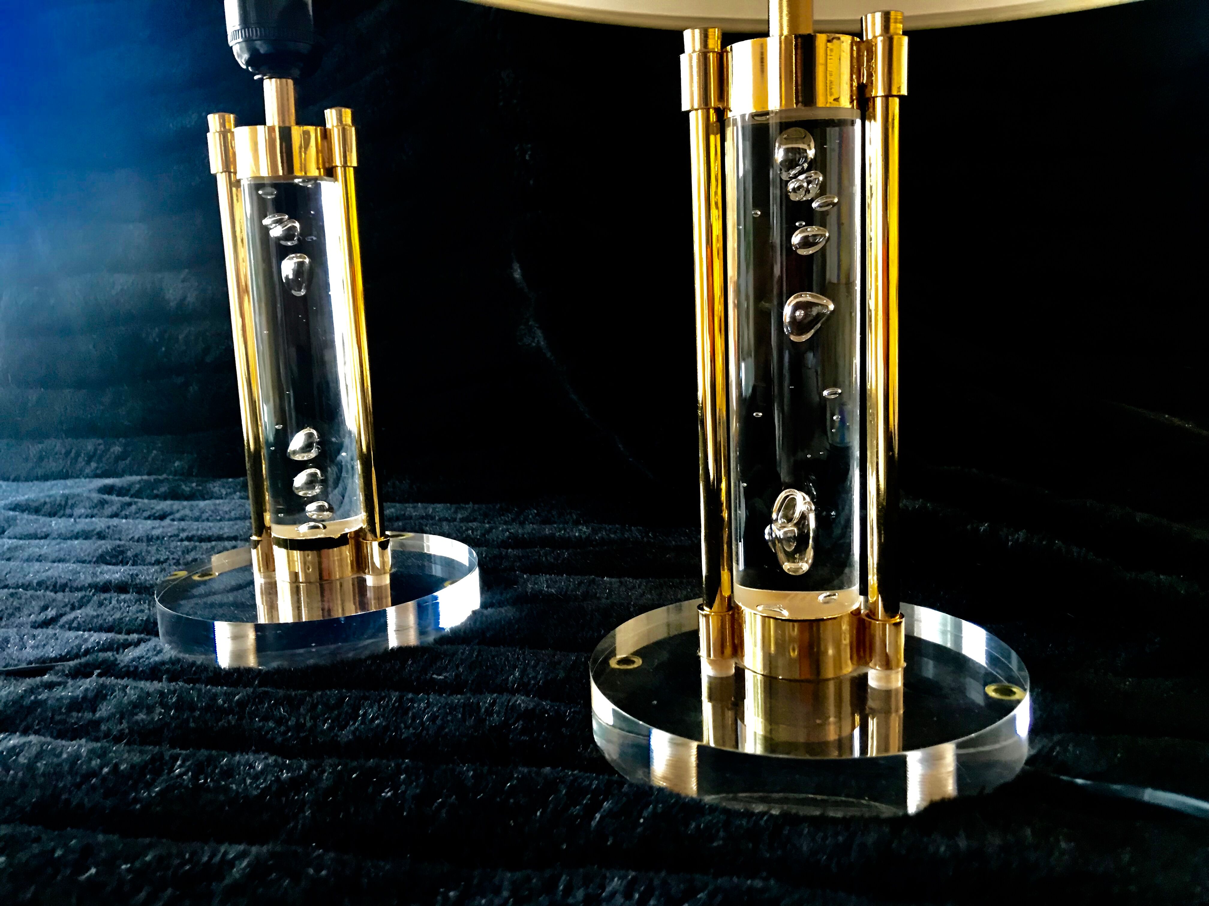 Pair of metacrilic lamps and gold structure