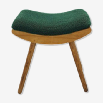 Vintage footrest with green fabric cushion