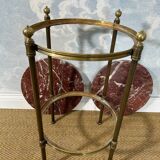 Two-tiered gueridon in Emperador marble on a brass structure, 1970s.