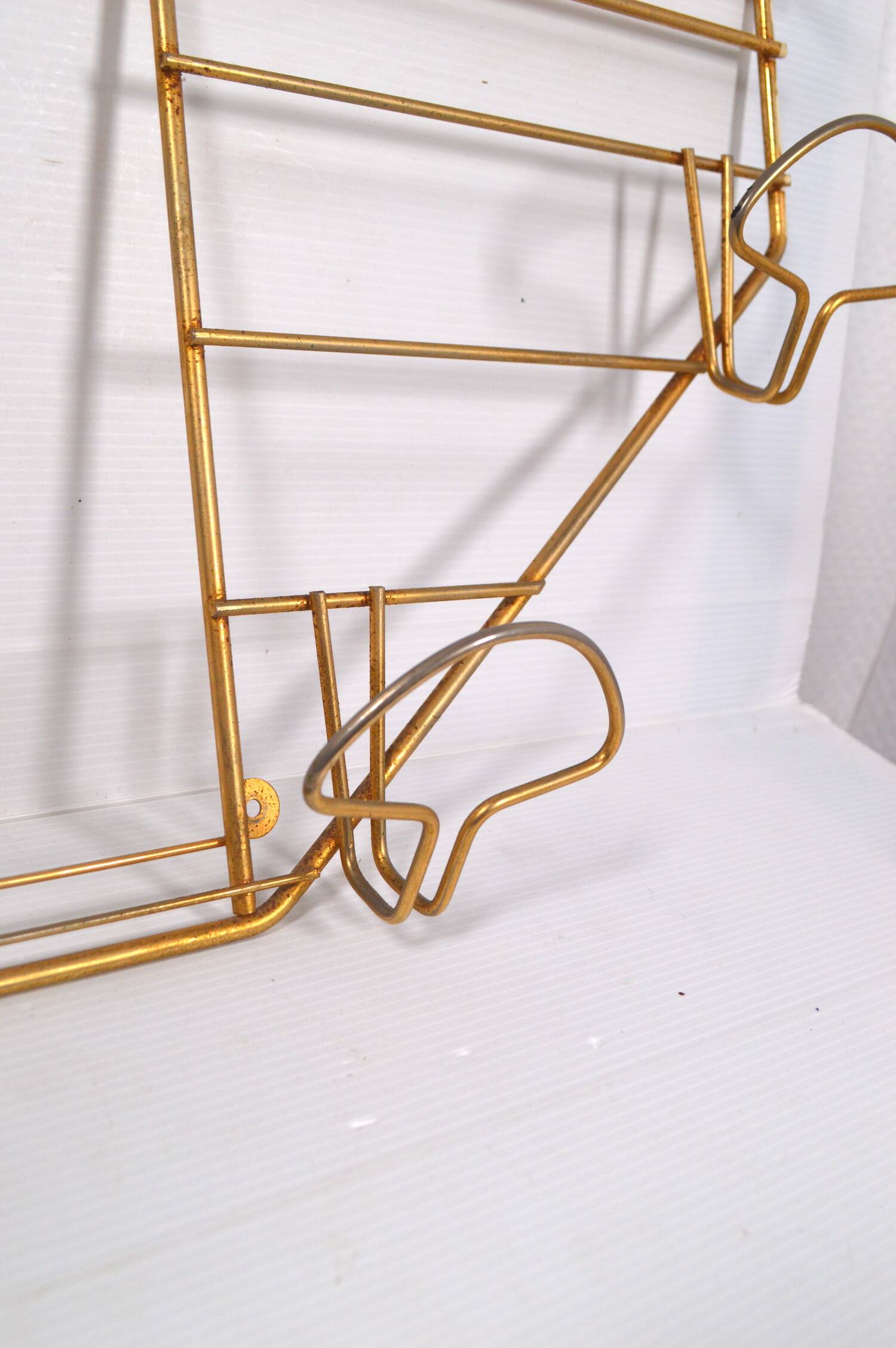 Golden wall coat rack