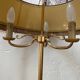 Lampadaire tripode en métal doré