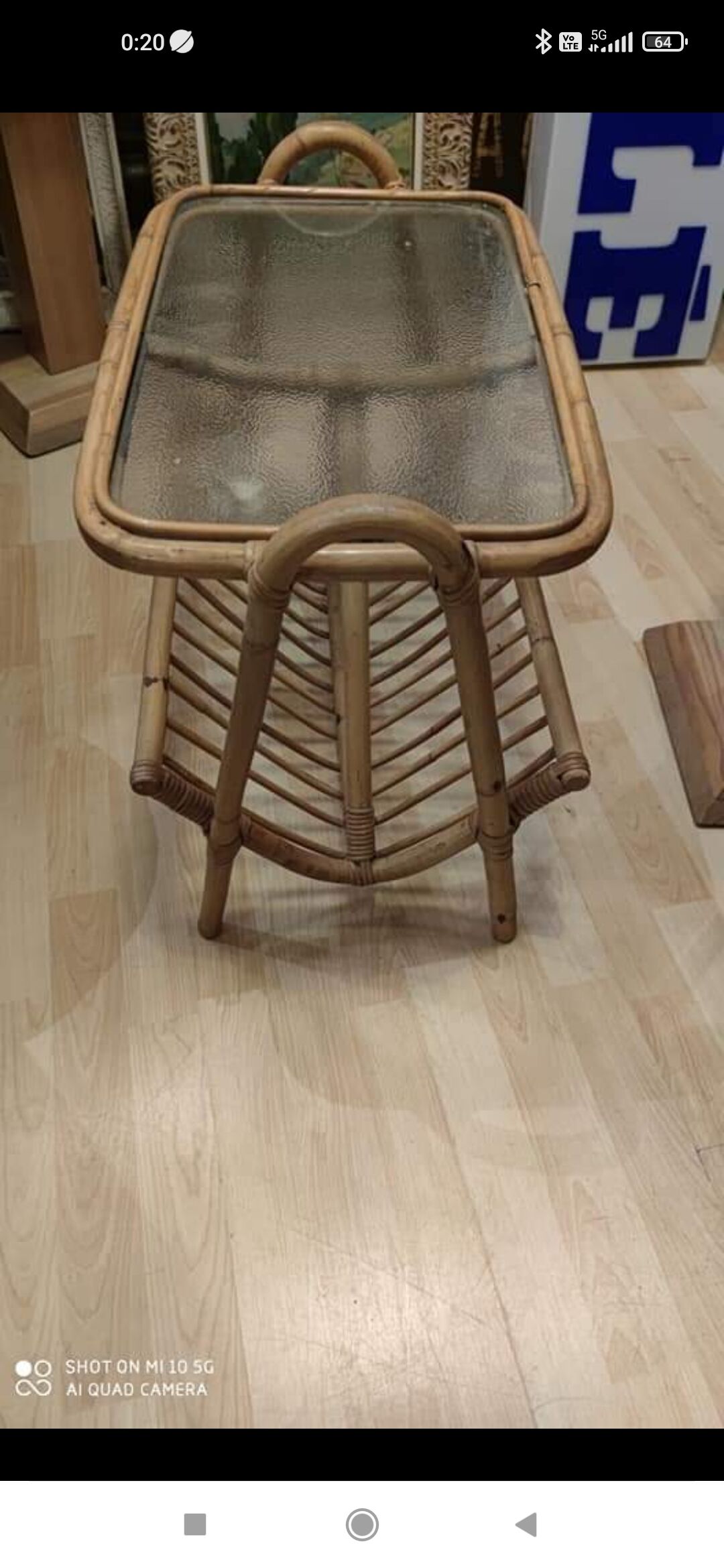 Rattan and frosted glass end table with magazine rack