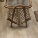 Rattan and frosted glass end table with magazine rack