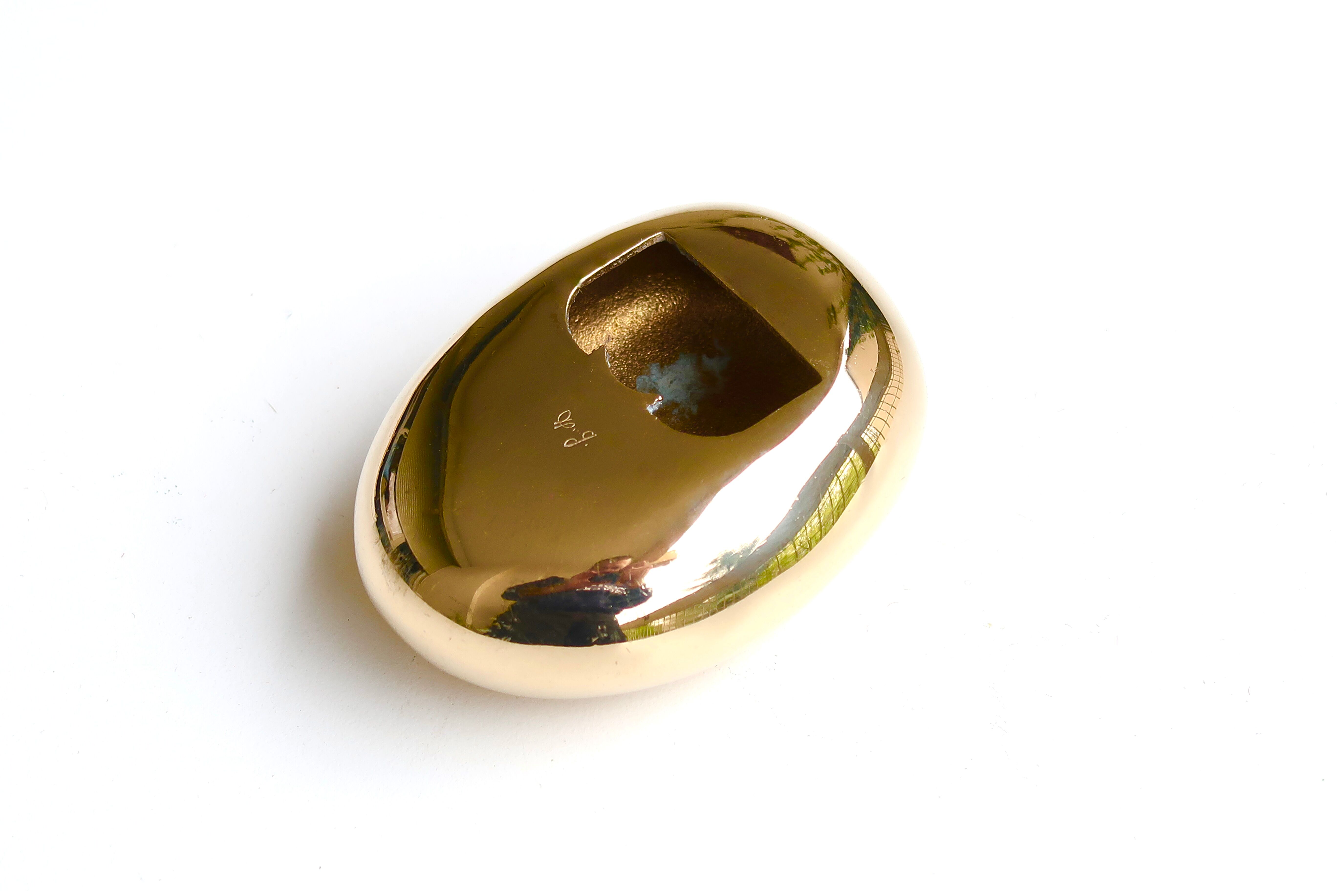 Bronze bottle opener by Monique Gerber 70s