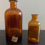 Lot of old glass perfumer bottles with original labels