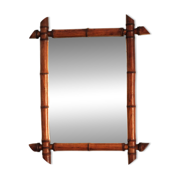 Small mirror in antique bamboo.