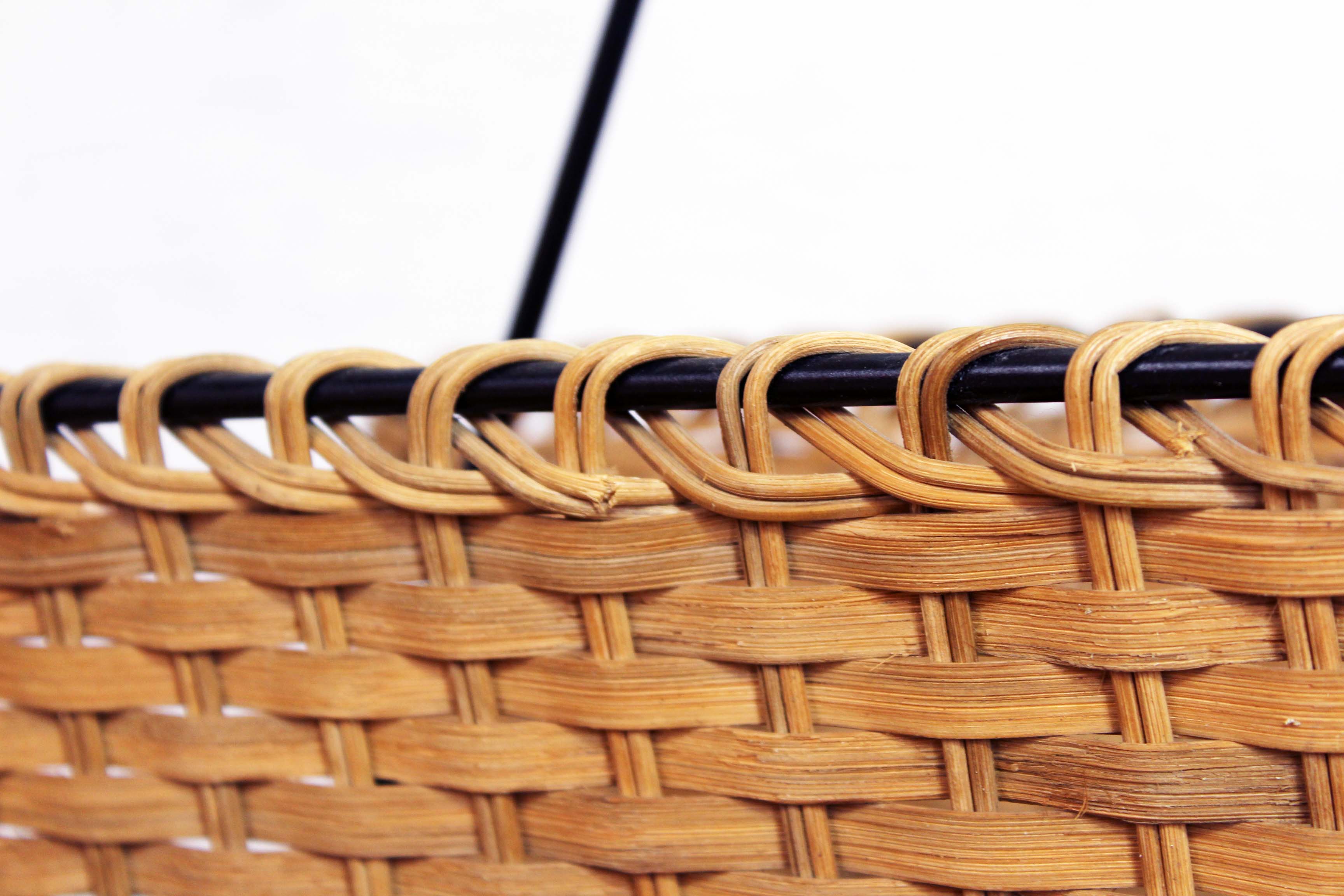 Vintage wicker magazine rack