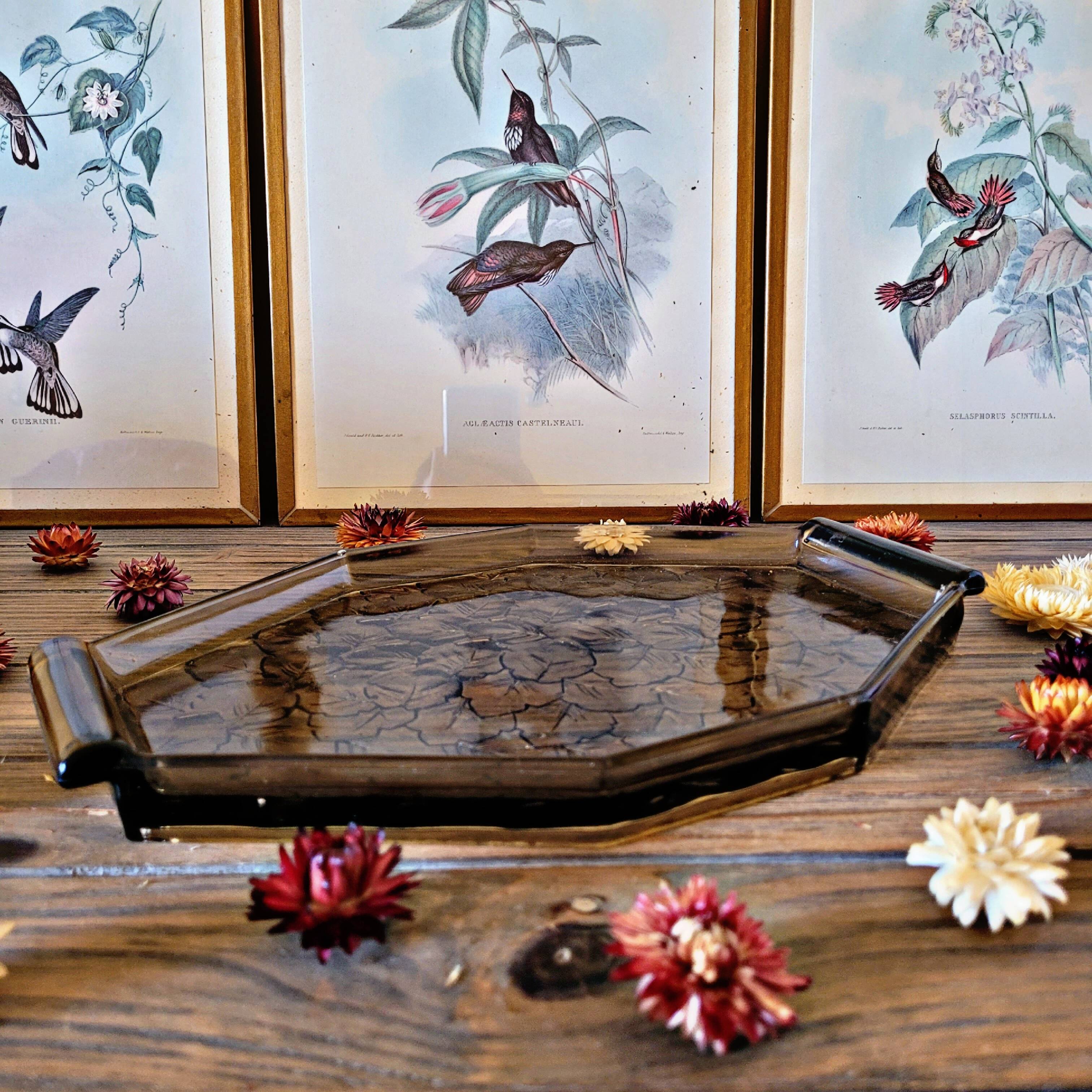 Art deco style black glass tray decorated with leaves
