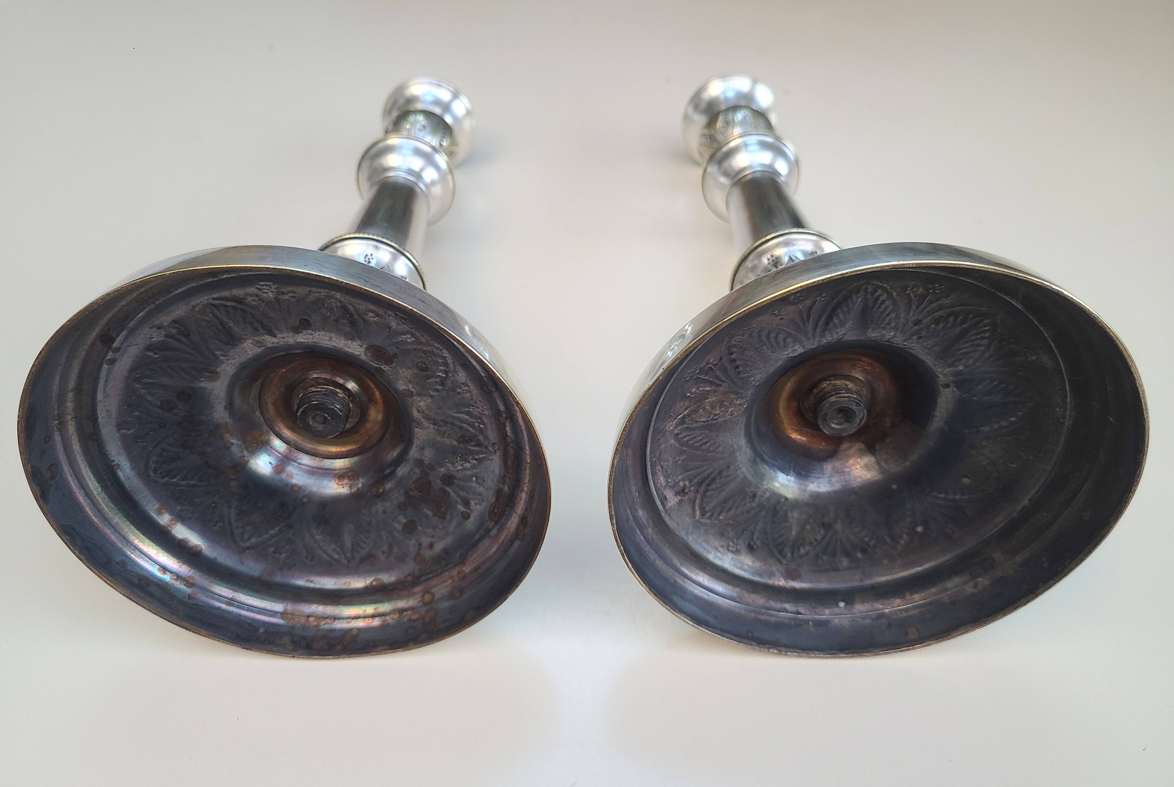 Antique silver-plated metal candlesticks