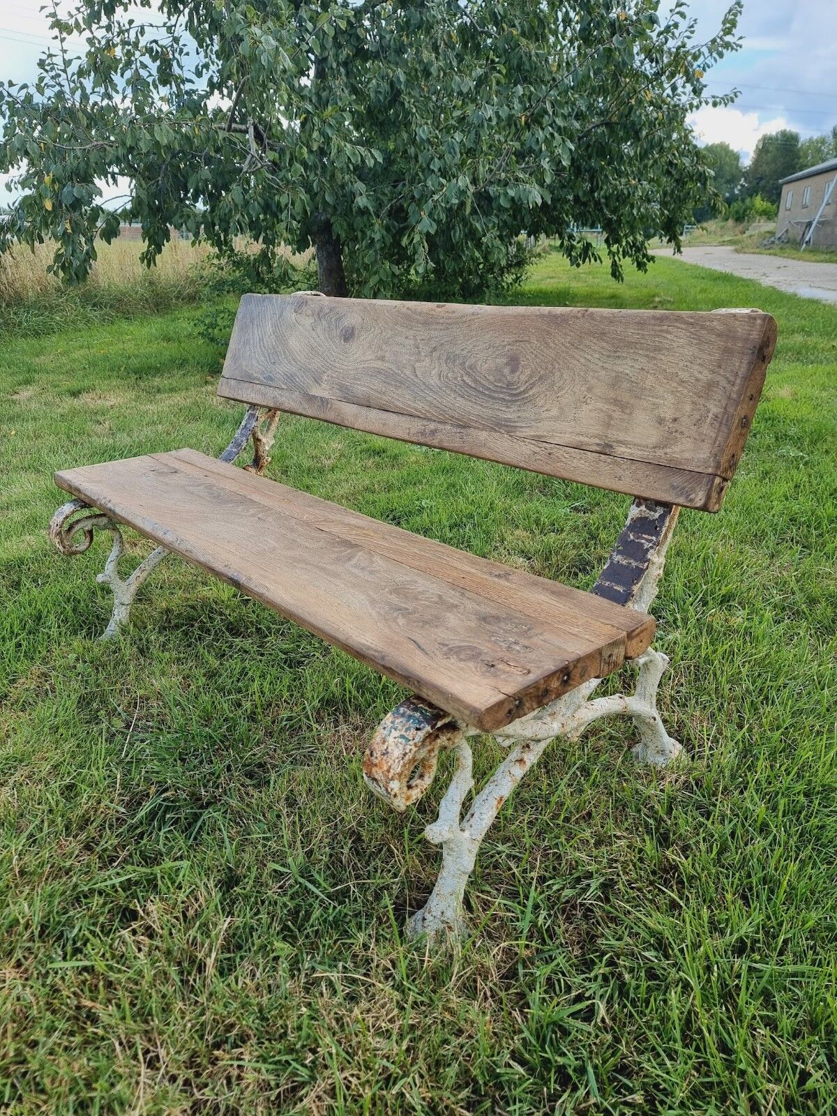Antique garden bench oak on cast iron legs 125 cm