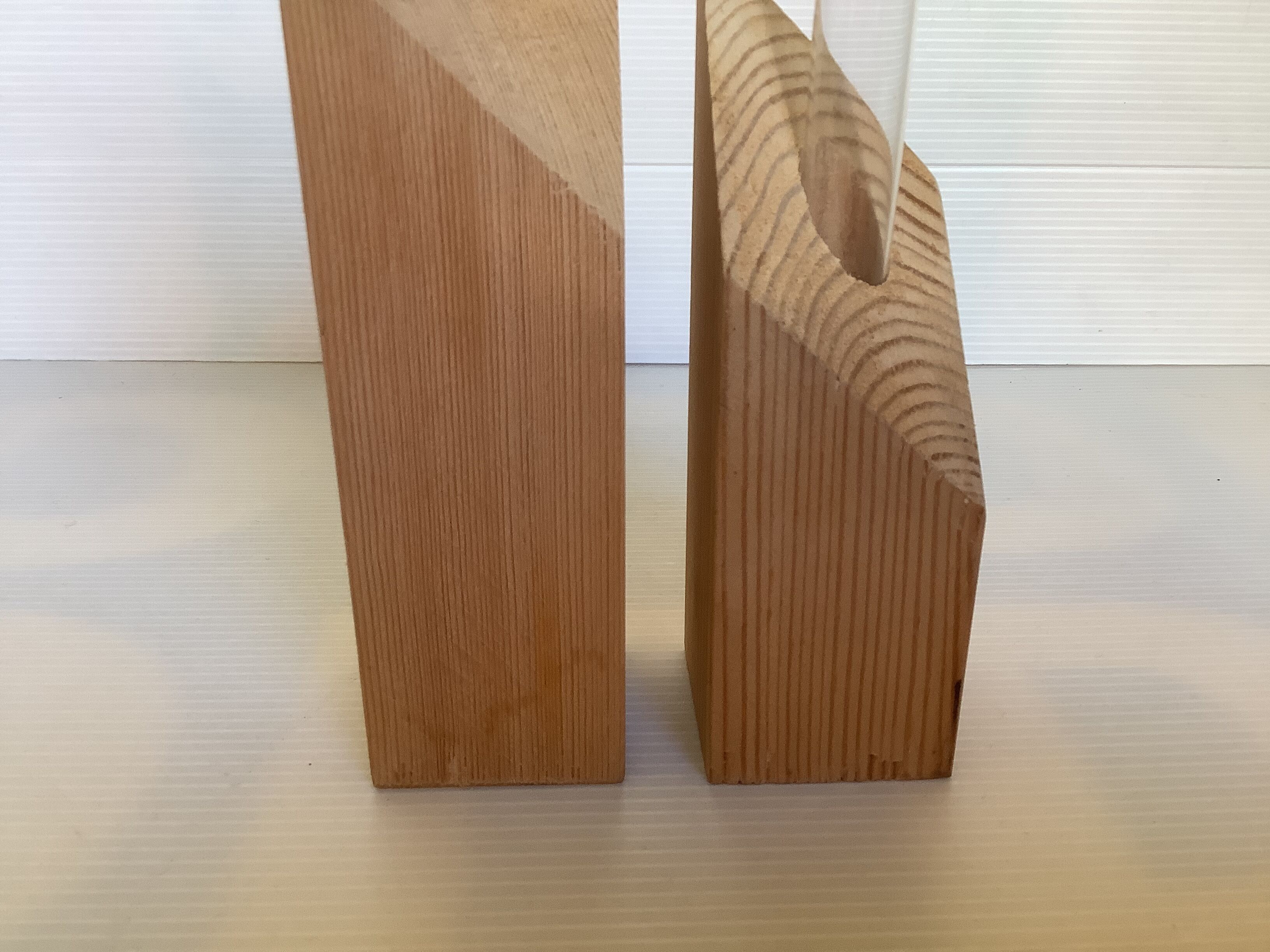 Pair of diamond-shaped wooden Scandinavian test tube vases.