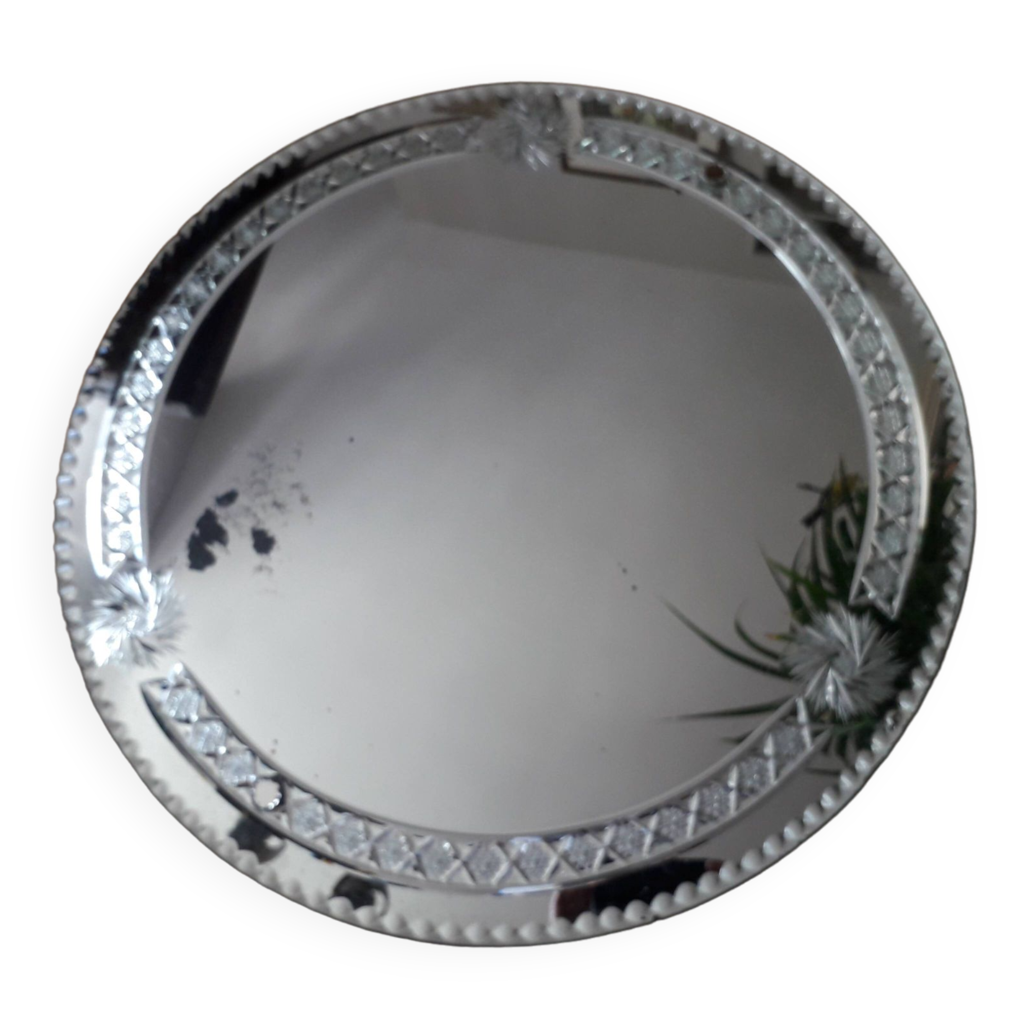 Large old round mirror finely decorated