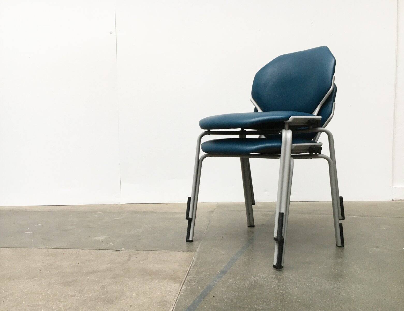 Stackable vintage leather dining chairs from the German space age by Fröscher, 1970s, set of 2.