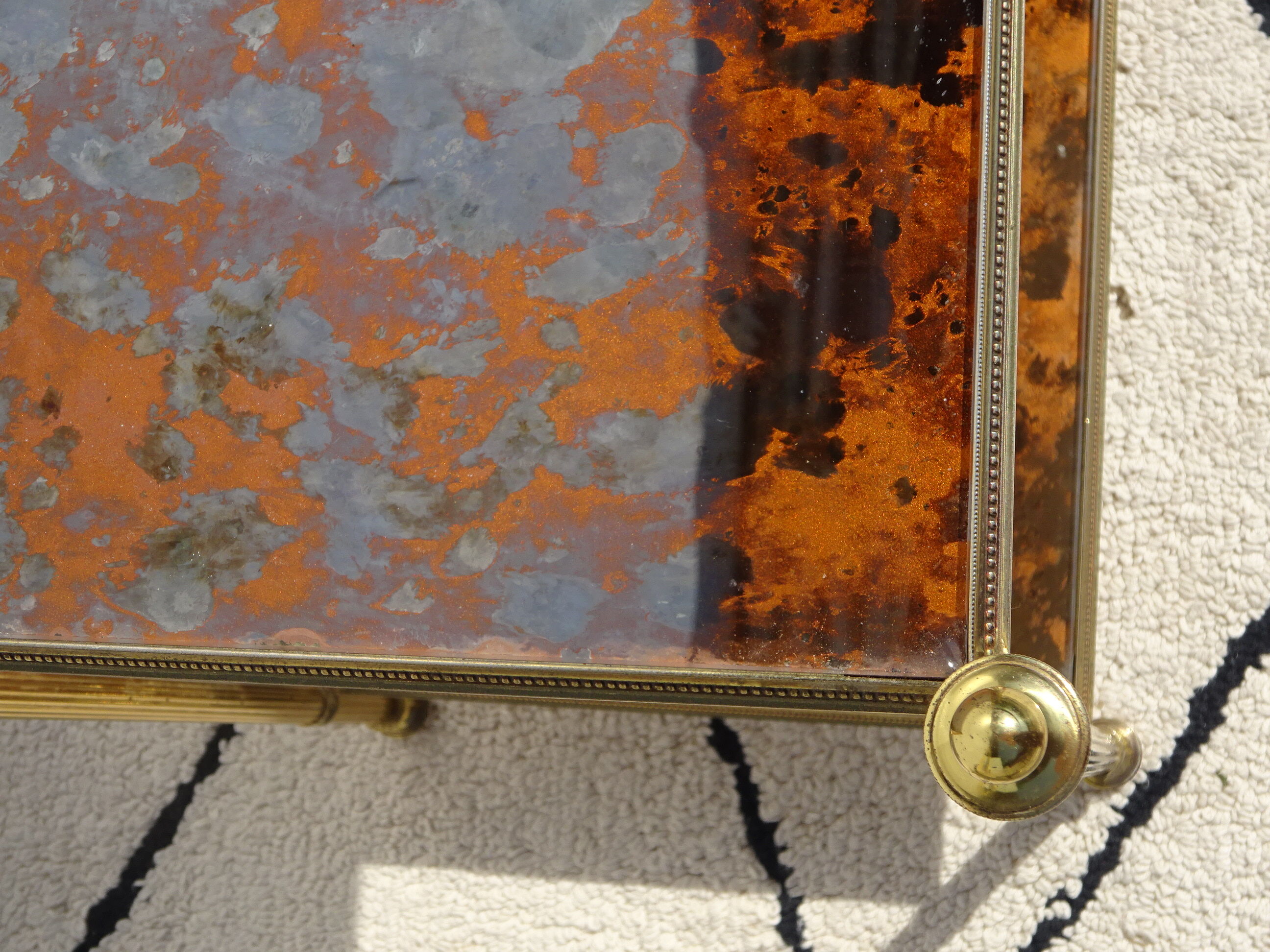 Pair of bedside tables in gilded brass and glass, midcentury