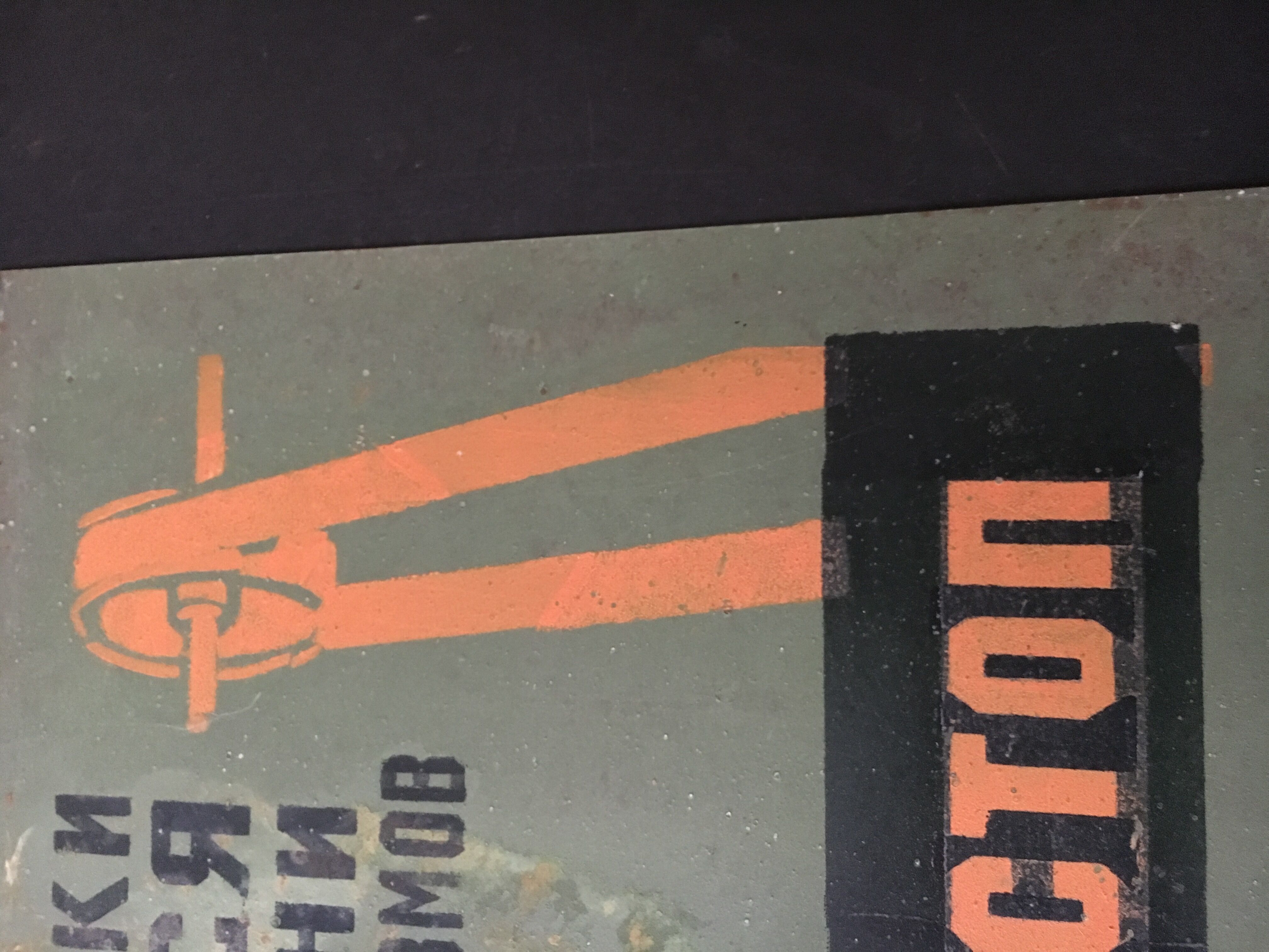 Old factory plaque in painted tin