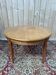 Table ronde extensible Style Louis XVI Merisier massif Sabots laiton