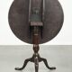Practical round antique English tilt top table from the 18th century
