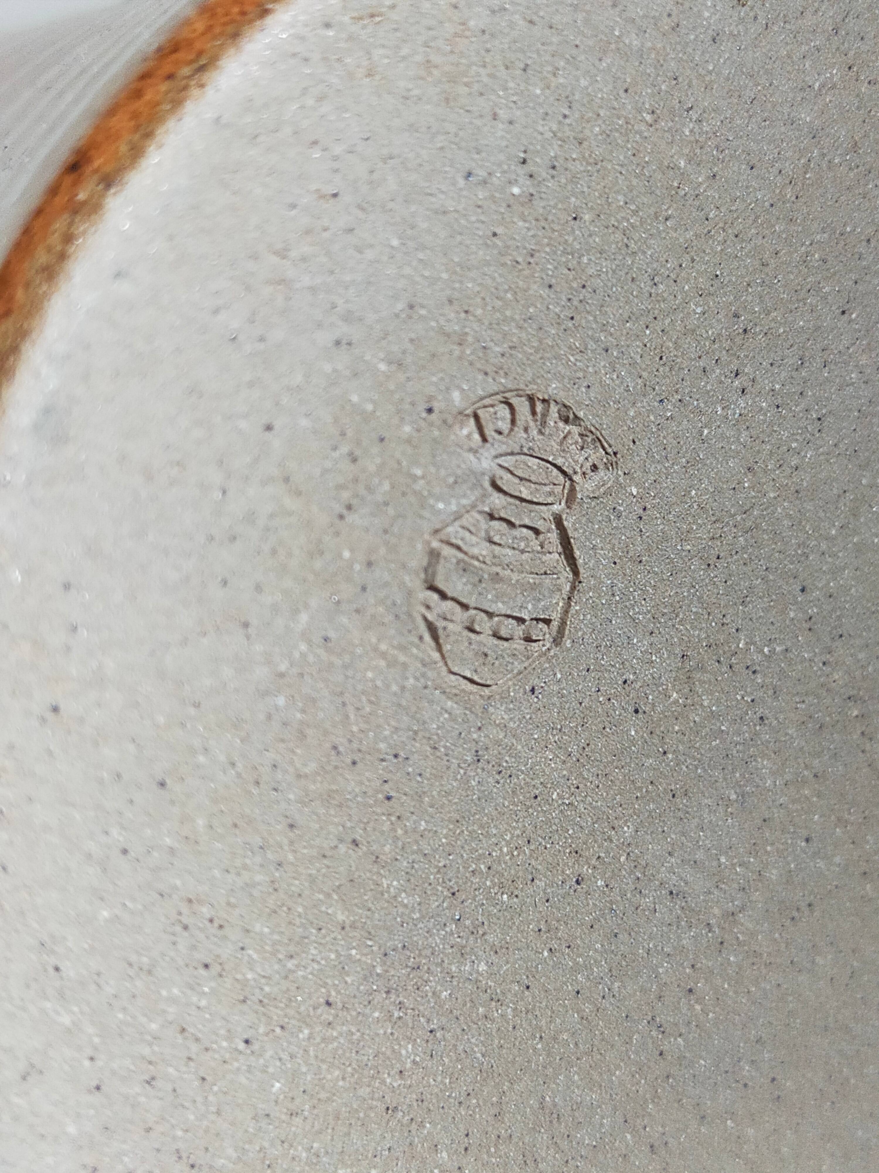 Vintage enameled stoneware potter's diabolo vase