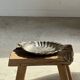 Large antique silver-plated bowl in the shape of a shell.