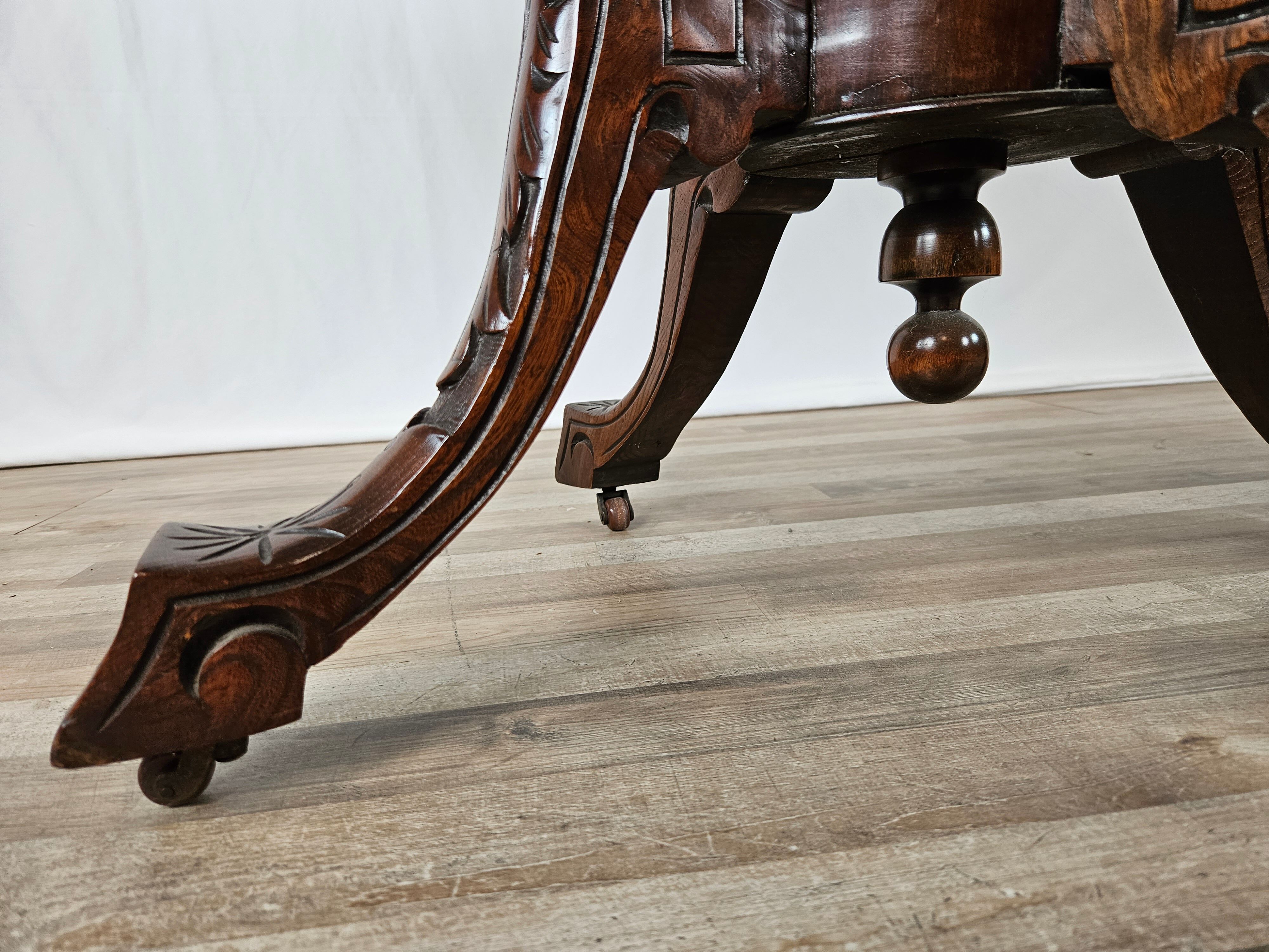 Coffee table in walnut with maple inlays and wheels