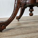 Coffee table in walnut with maple inlays and wheels