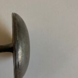 Pedestrian crossing nail hook in Paris 1950