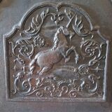 Plaque de cheminée ancienne en fonte