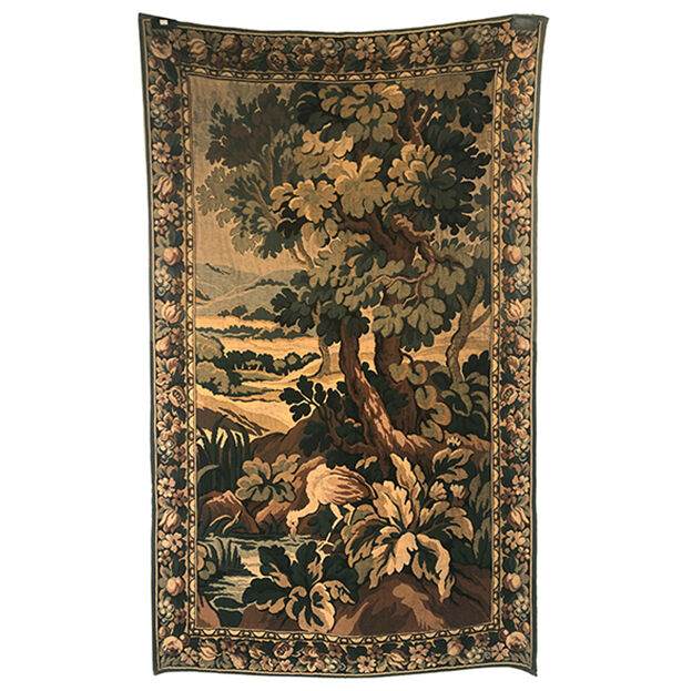Tapestry decorated with a pink flamingo in a green landscape, woven by hand