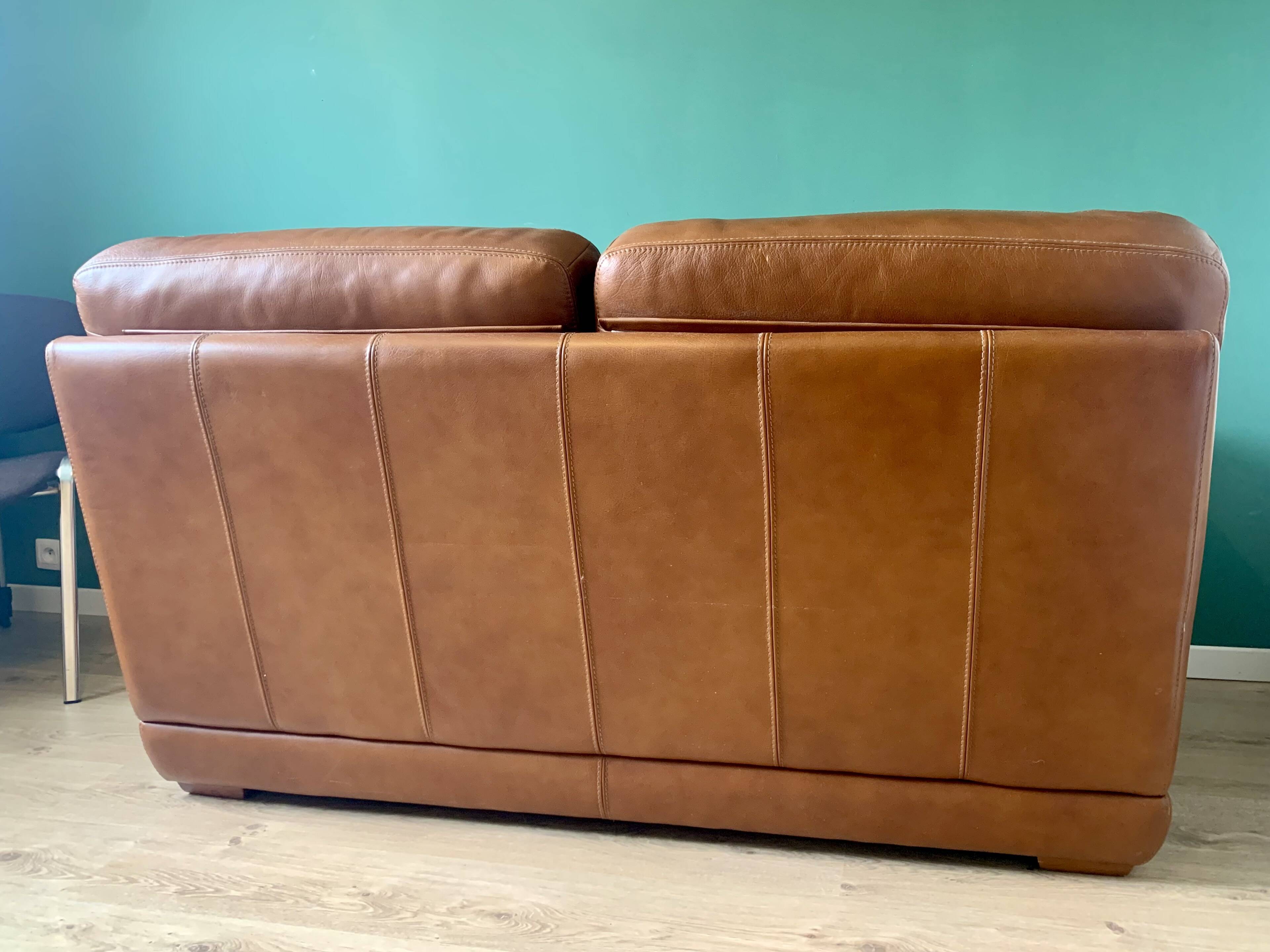 Two-seater leather sofa