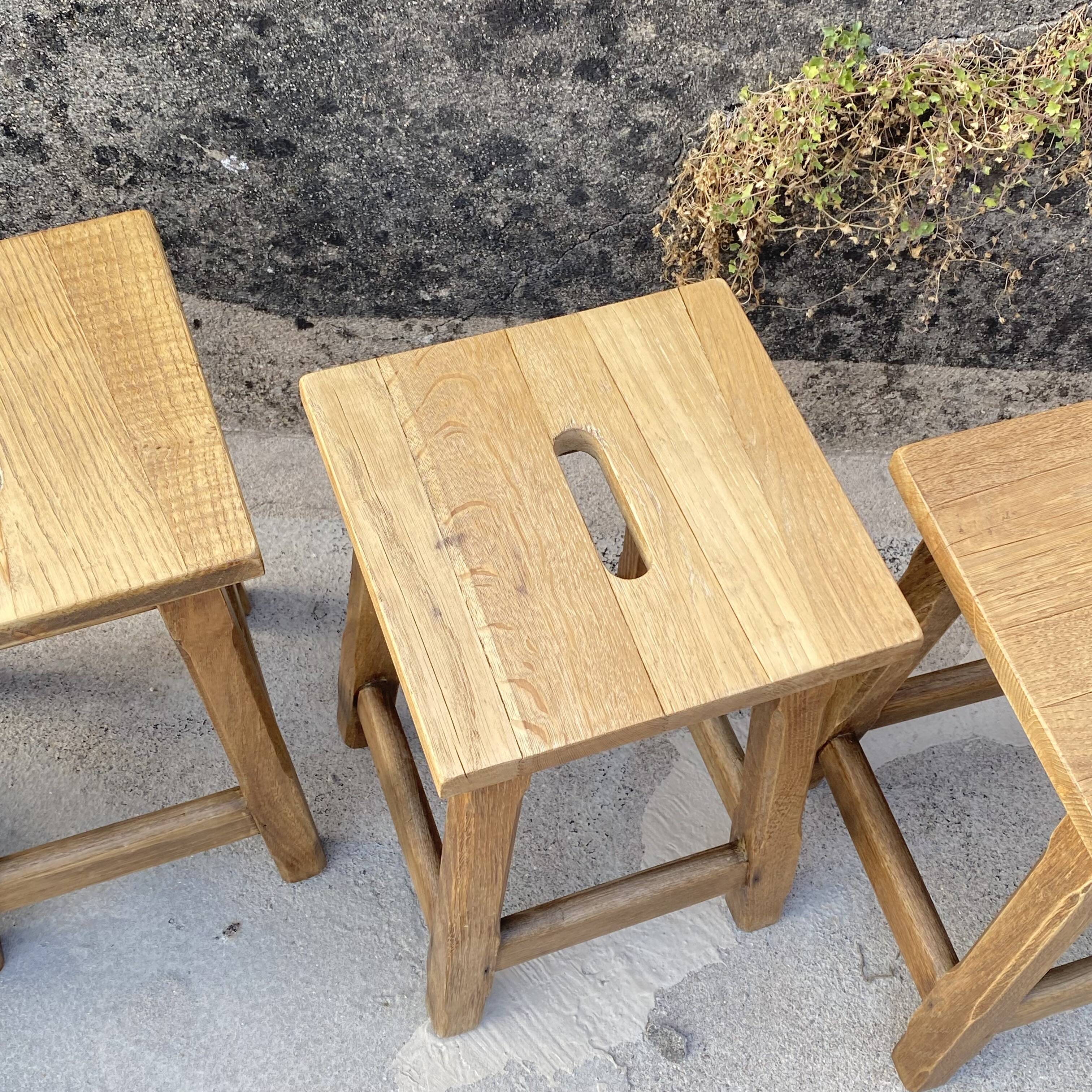 Set of 4 antique wooden farm stools