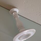 Old white earthenware candlestick