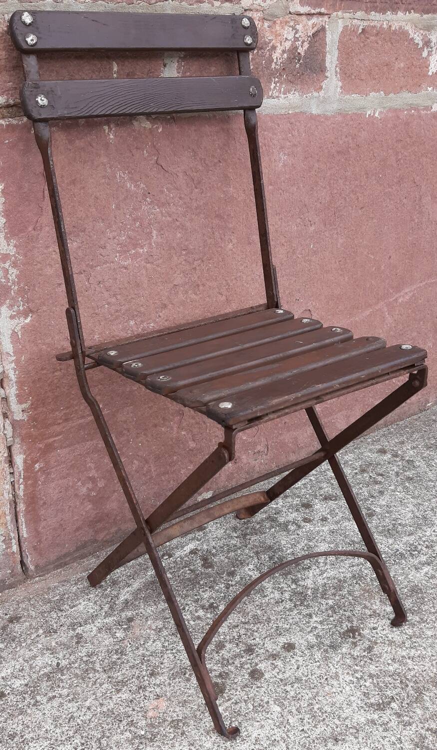 Foldable wrought iron chair