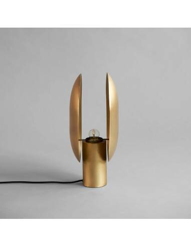 Gold-colored aluminum table lamp, contemporary work.