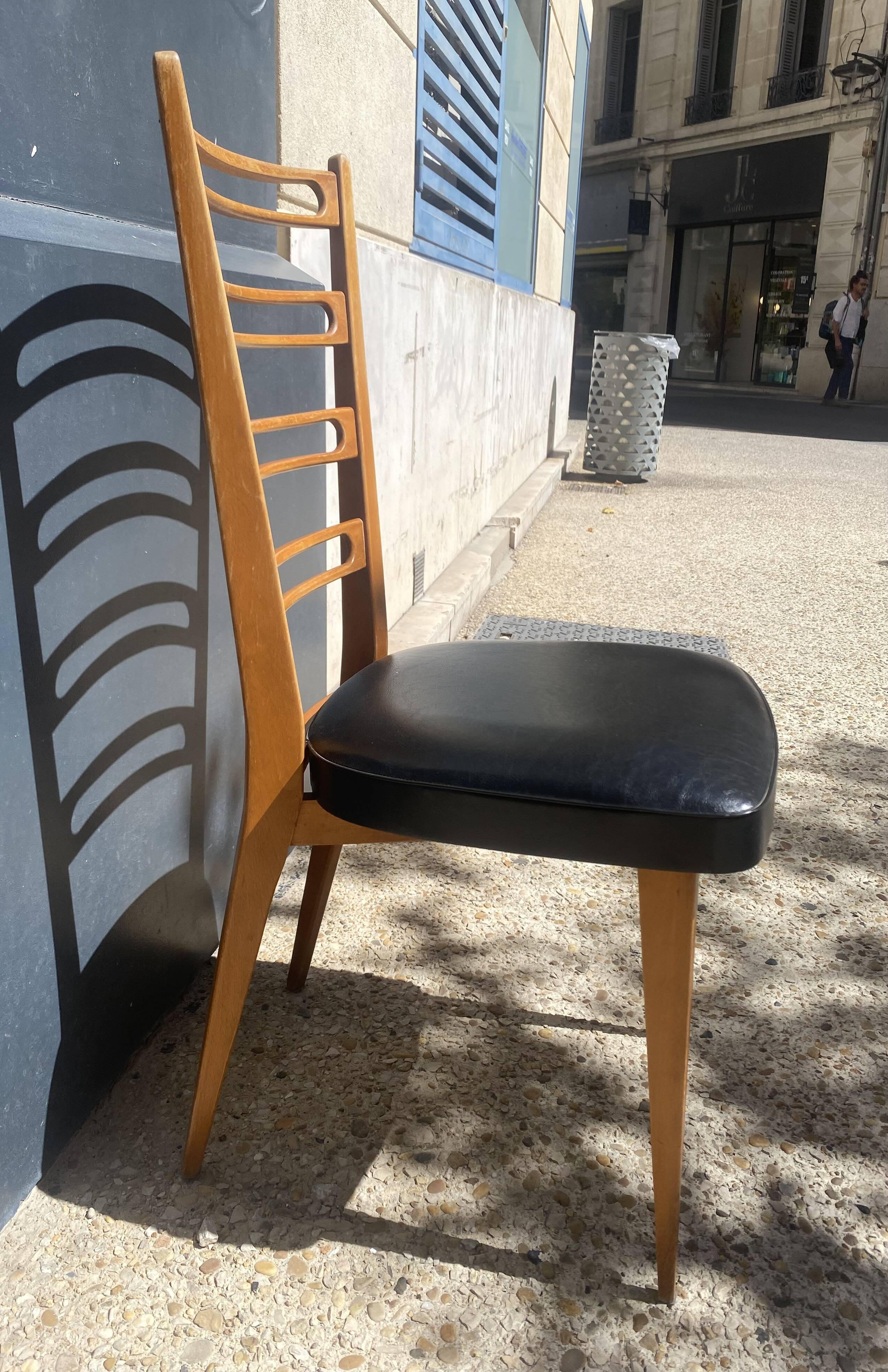 6 chaises bois et skaï noir années 60