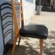 6 chaises bois et skaï noir années 60