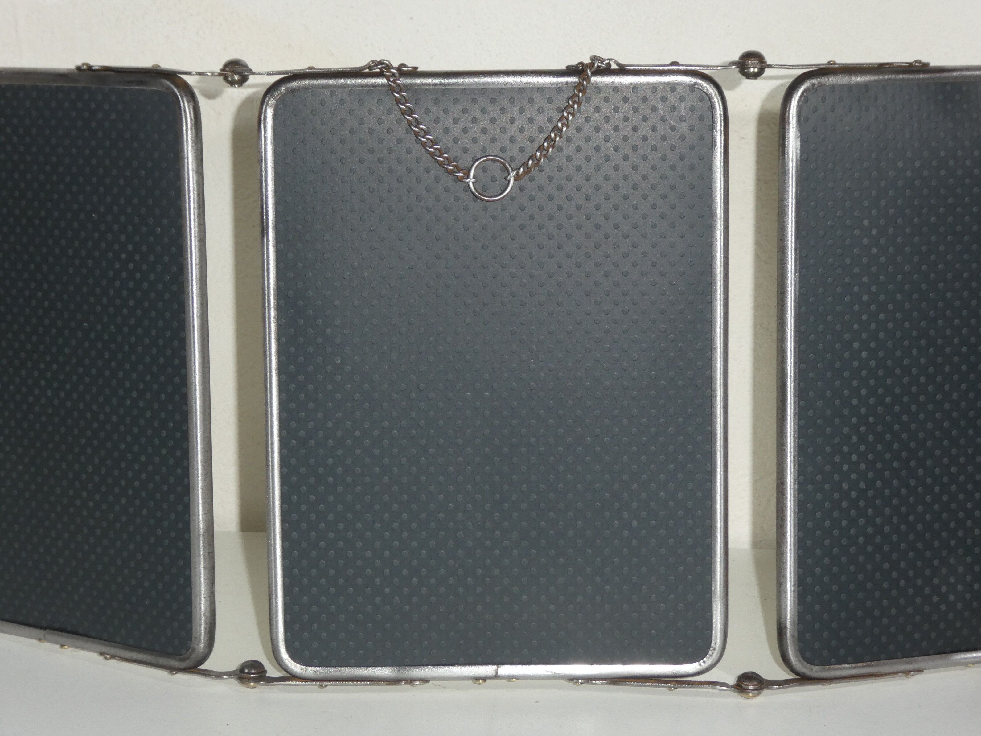 Tryptic barber's mirror