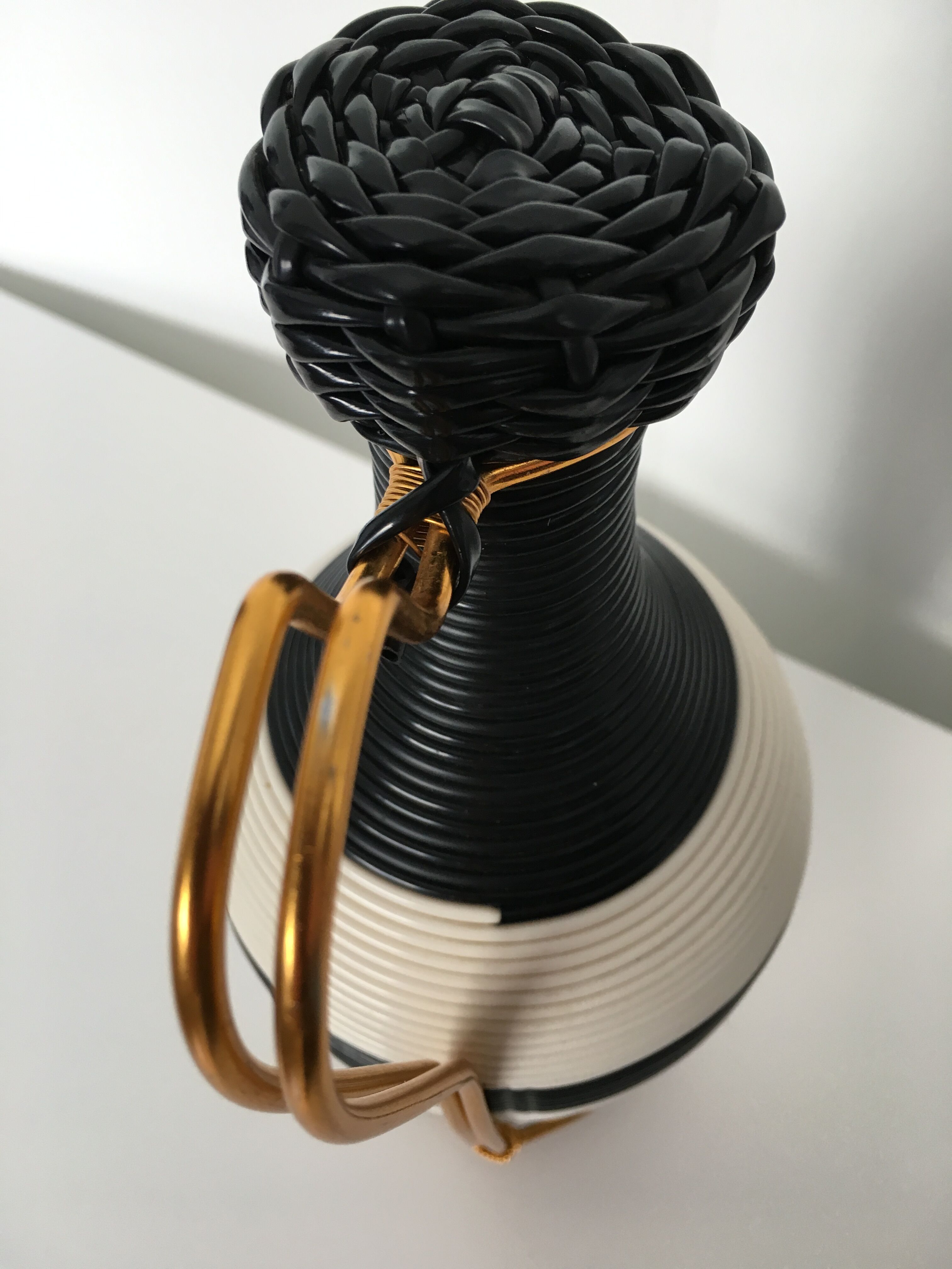 White and black scoubidou bottle