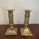 Pair of brass column candle holders