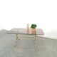 Smoked glass coffee table with gold-coloured legs from Sweden