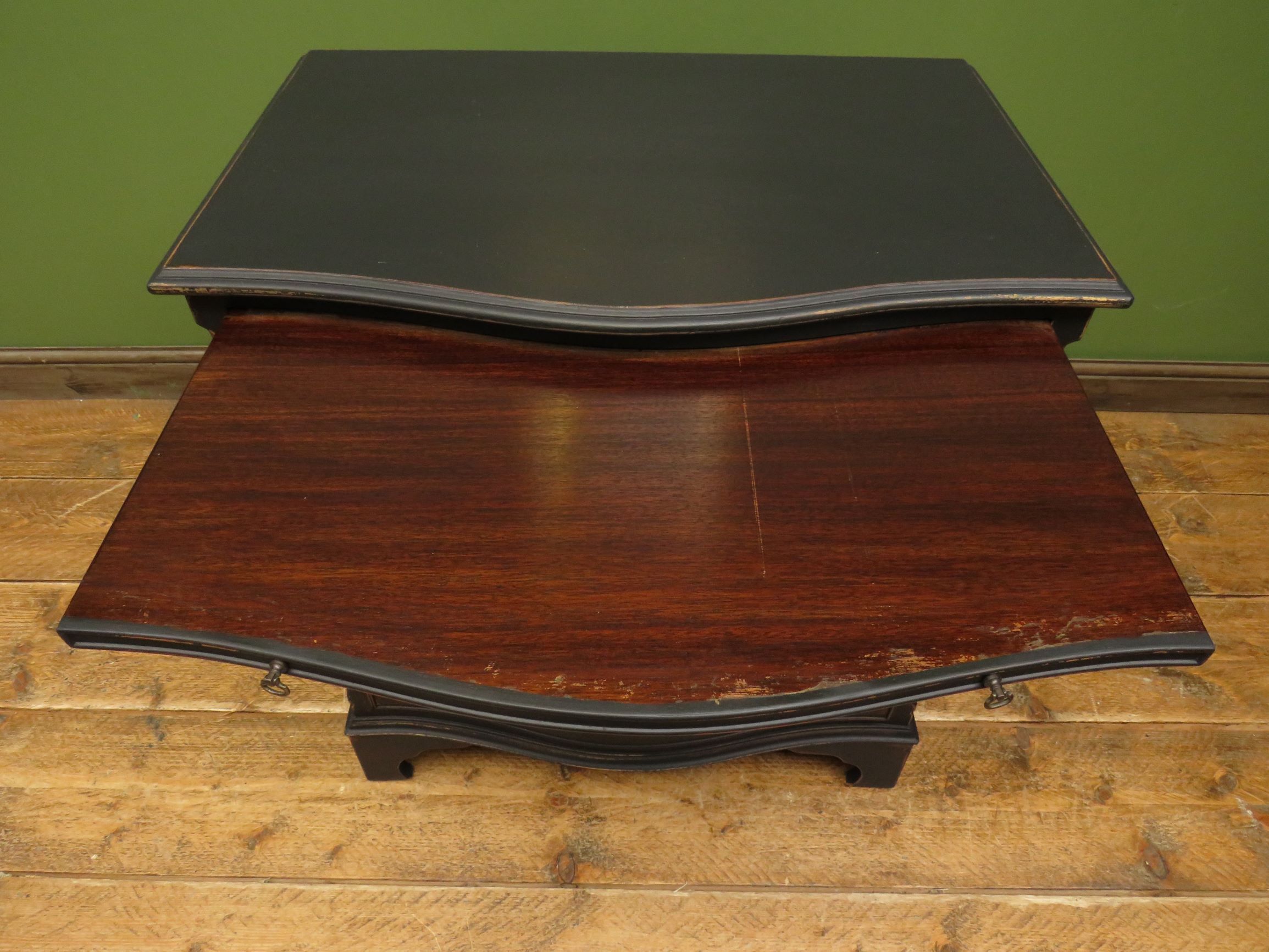 Antique black painted serpentine bachelors chest of drawers