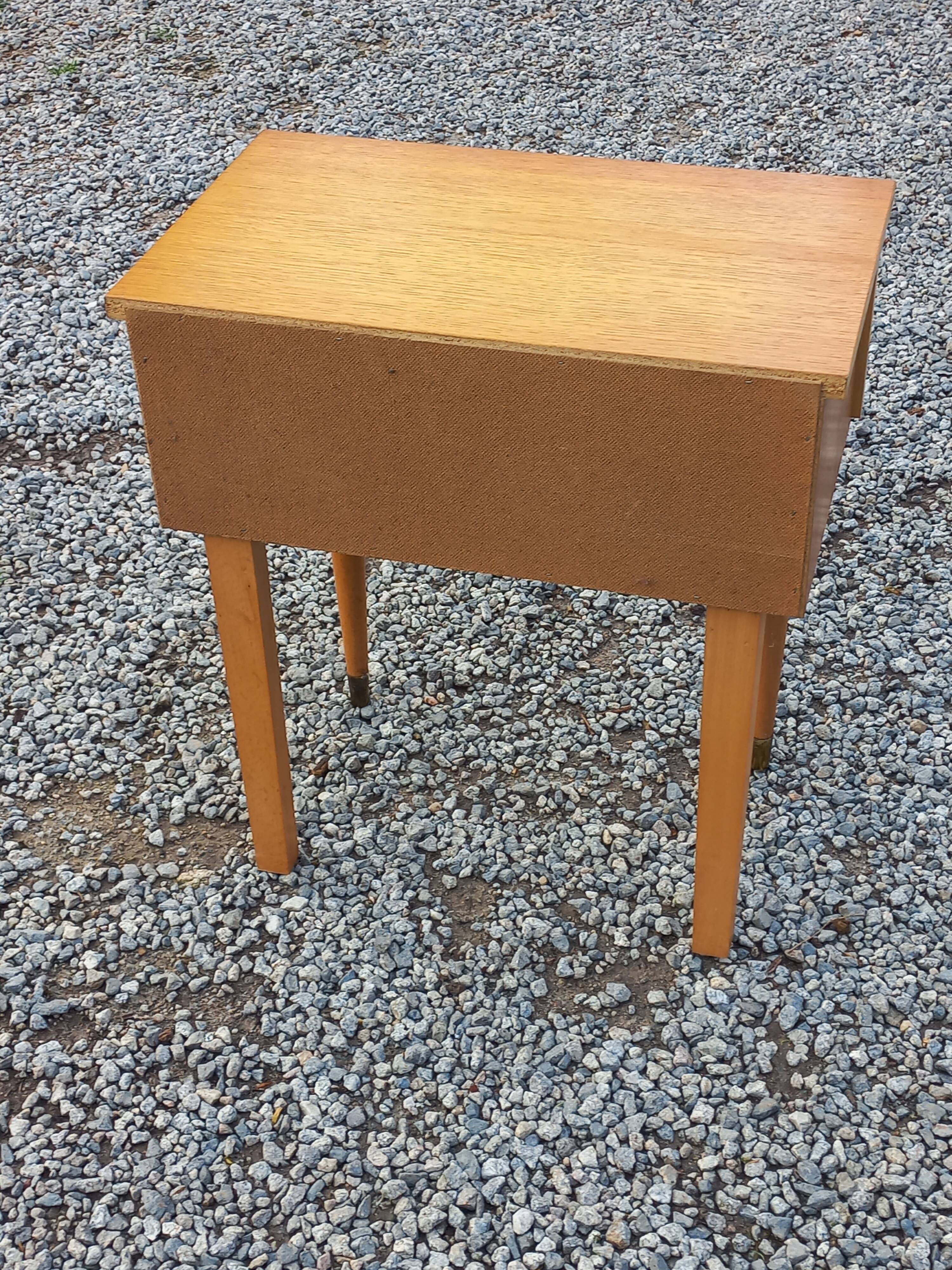 Vintage 1950s bedside table in blond oak with conical legs