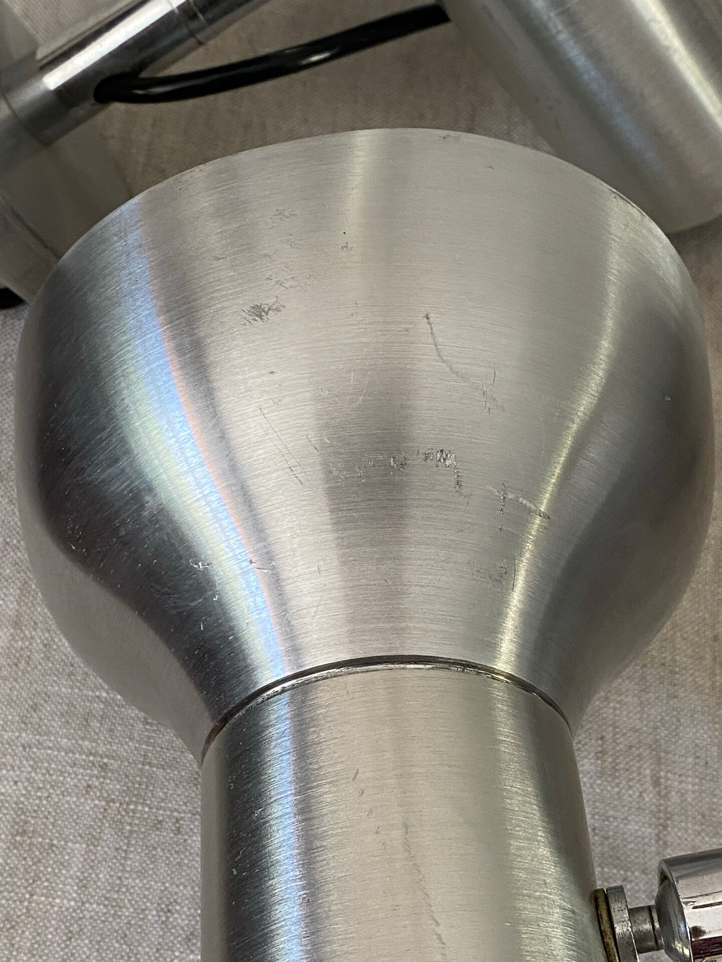 Pair of brushed metal wall sconces