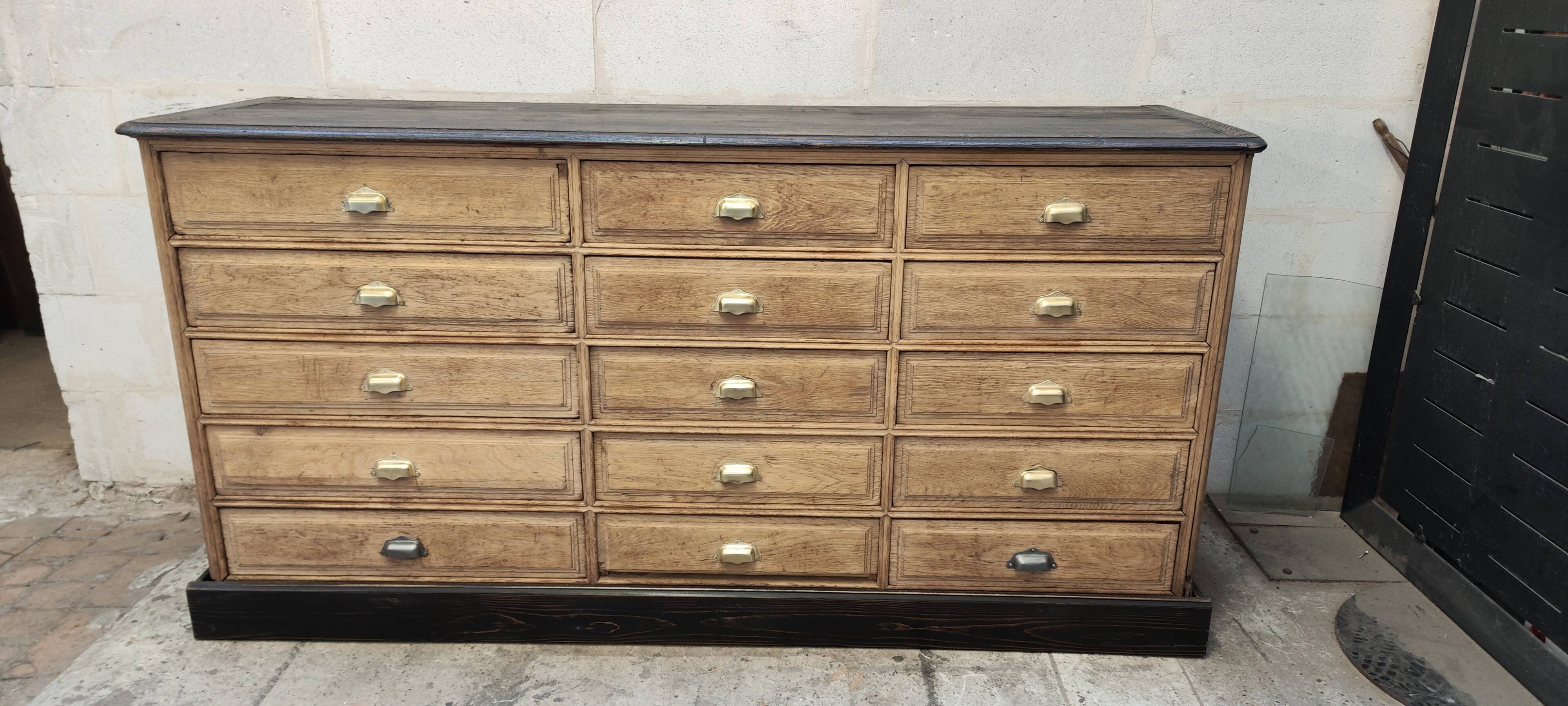 Old oak cabinet with fifteen drawers