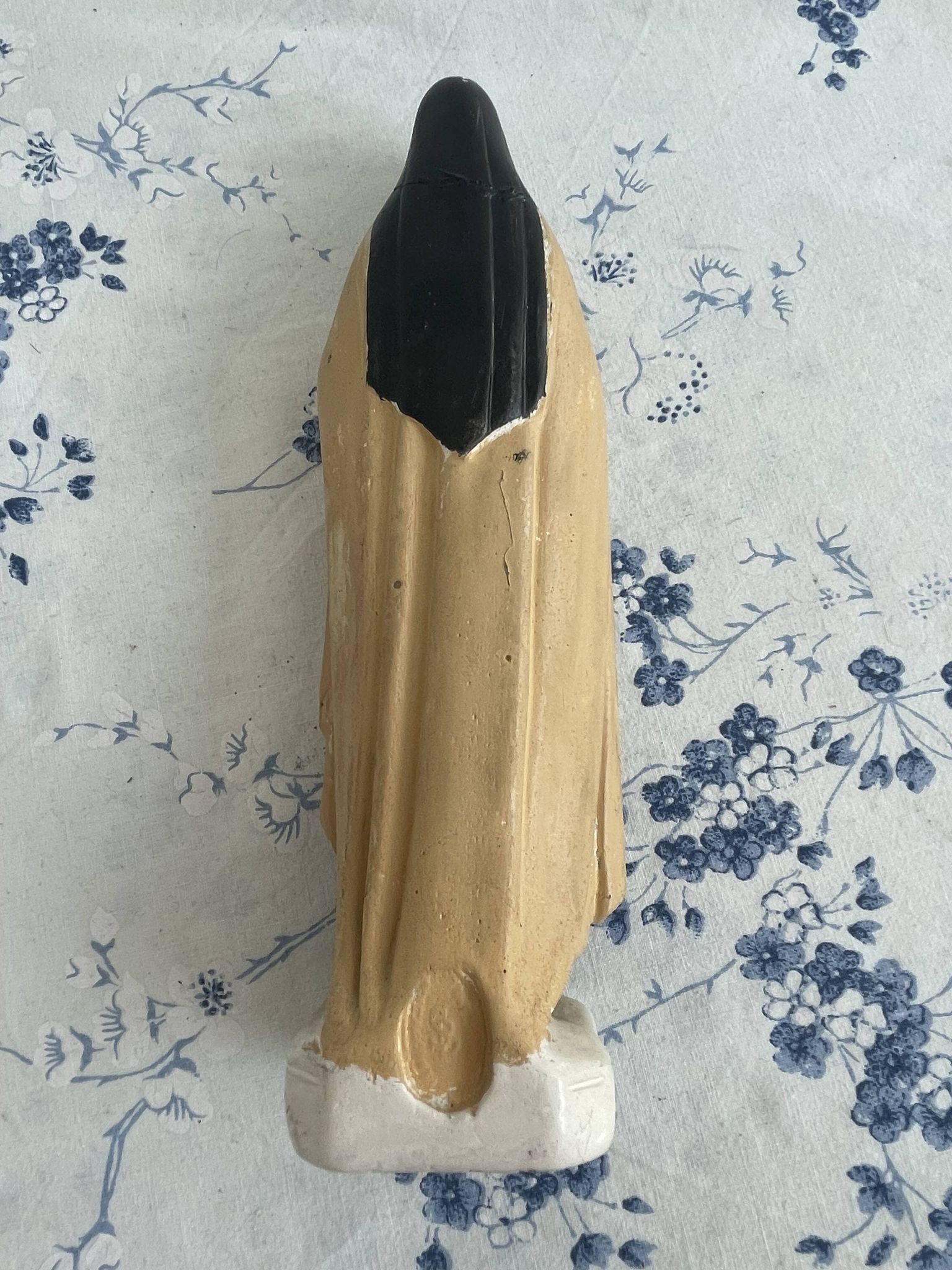 Antique statue of Saint Therese of Lisieux, religious plaster figurine