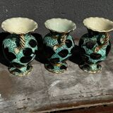 Trio of Vallauris vases in turquoise and black, highlighted with gold, 22 cm high
