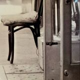 Photo of New York, Cat with rolling eyes in front of a shoe shine, 1960