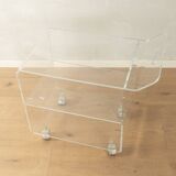 Wonderful side table from the 1960s, high-quality frame and shelf made of transparent acrylic with chrome-plated castors